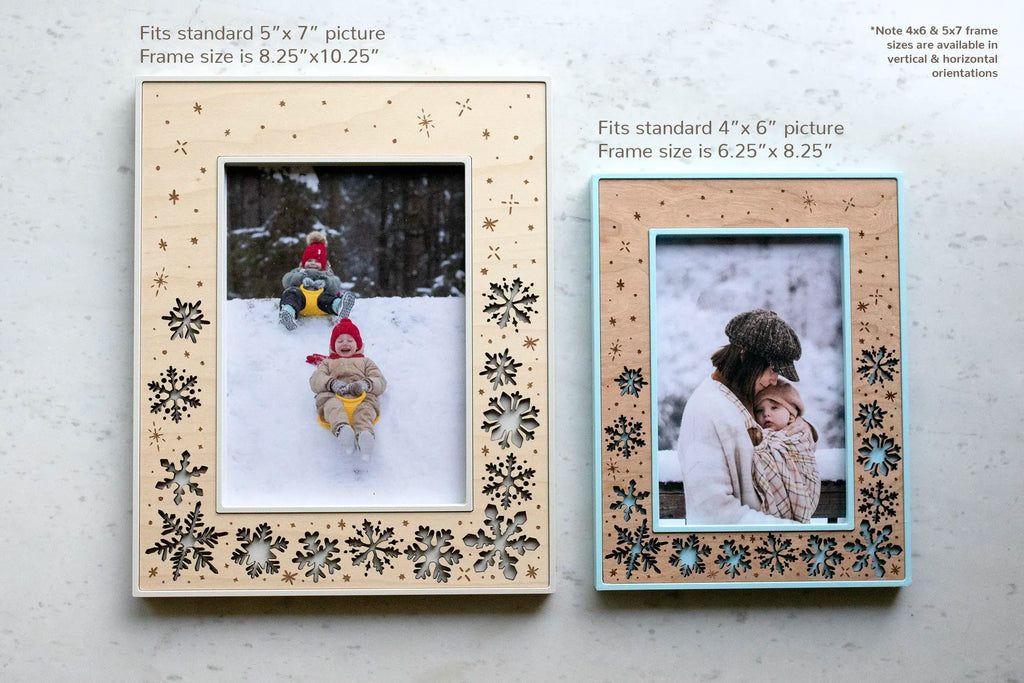 5x7 and 4x6 holiday picture frames with laser-cut wood inlays, maple and cherry wood. These snowflakes picture frames are available in various winter colors and shades of blue. Frames can be personalized with an engraved message or left text-free for an all snowflake design. Sit on tabletop or hang on the wall for winter holiday decor.
