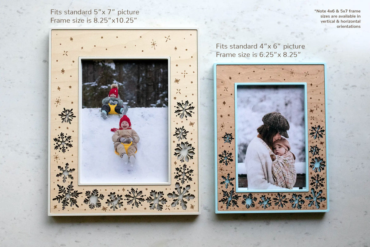 5x7 and 4x6 holiday picture frames with laser-cut wood inlays, maple and cherry wood. These snowflakes picture frames are available in various winter colors and shades of blue. Frames can be personalized with an engraved message or left text-free for an all snowflake design. Sit on tabletop or hang on the wall for winter holiday decor.