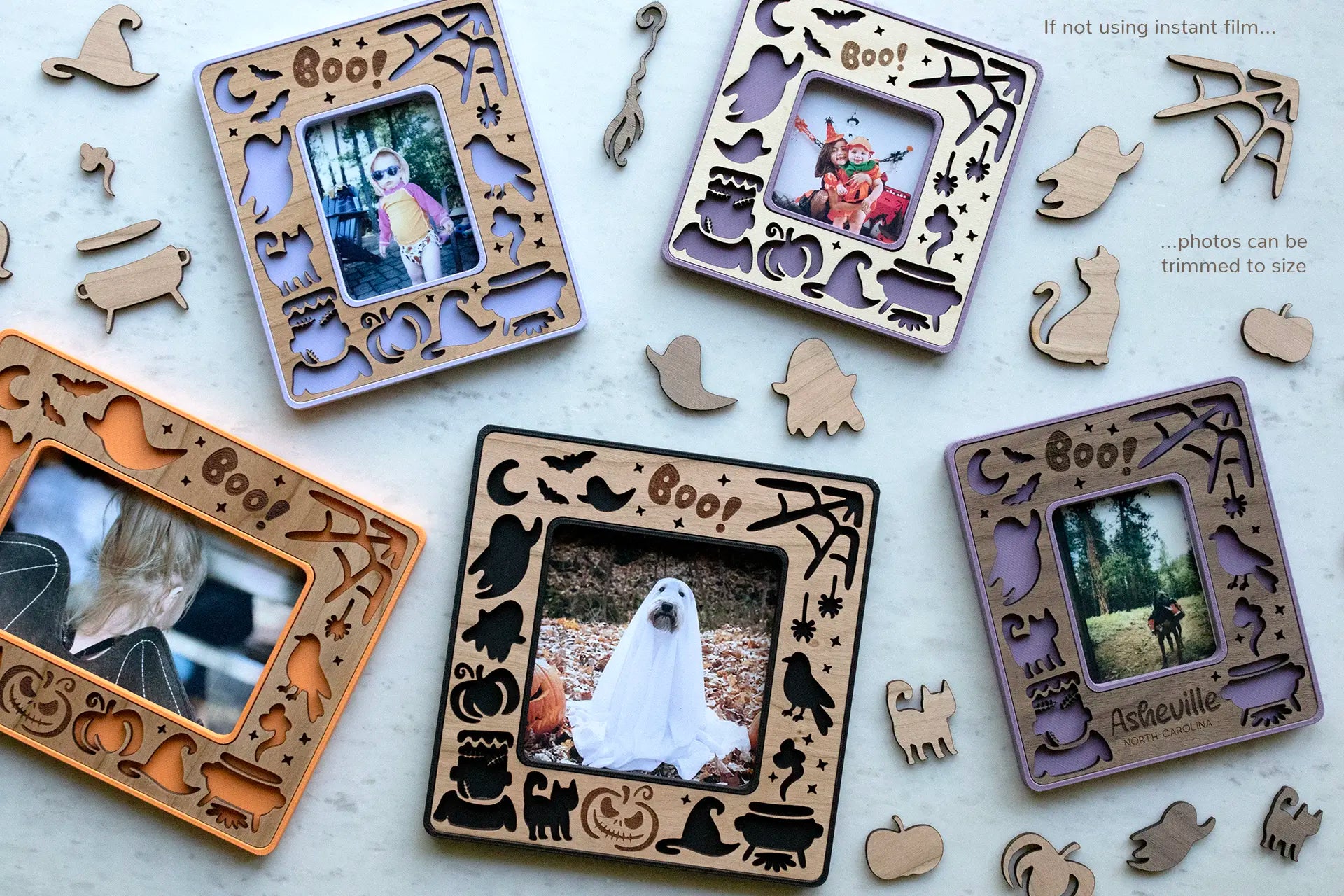 Magnetic Halloween picture frames with photos of kids in Halloween costumes and dogs dressed as ghosts. Frames feature Halloween pumpkins, ghosts, witch's hat, moon, and bats with an engraved "Boo!".