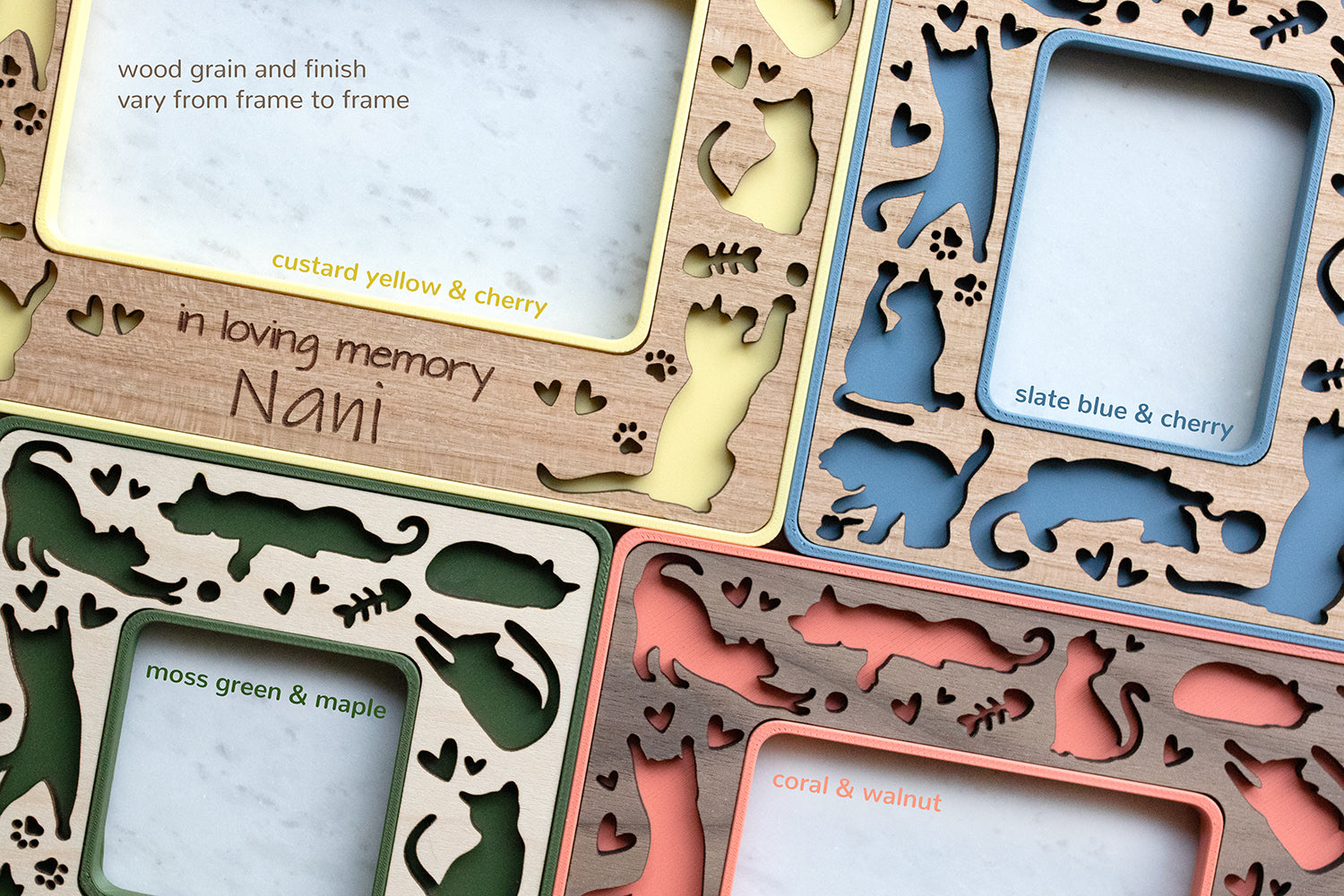 Four colorful laser cut wooden magnetic frames featuring whimsical cats. The frames feature playful cats and are available with personalization or without personalization. There is a note that reads "wood grain and finish vary from frame to frame".