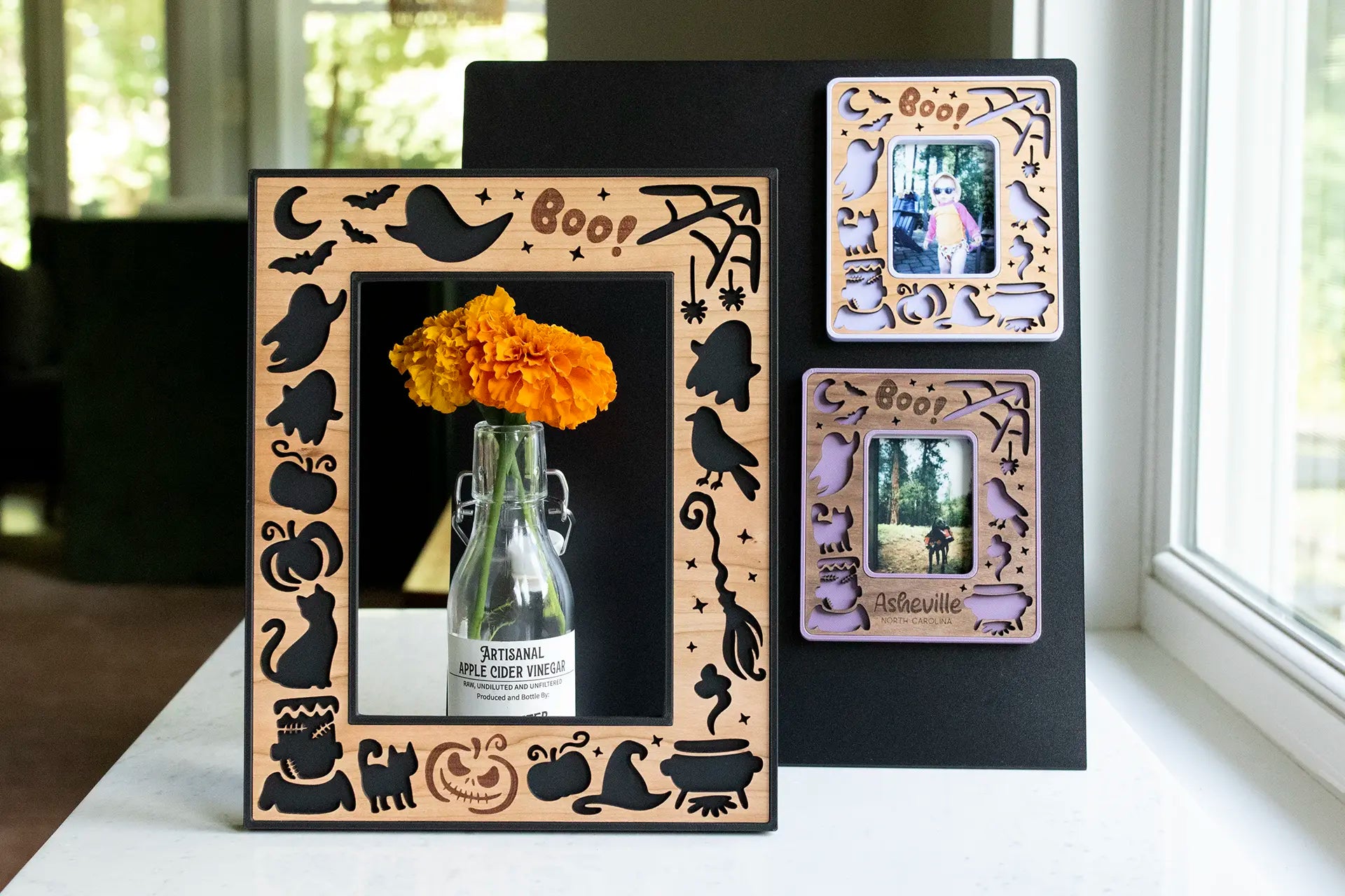 Personalized Halloween keepsake frames with laser cut pumpkins, ghosts, moon, and stars. Custom engraving options available.