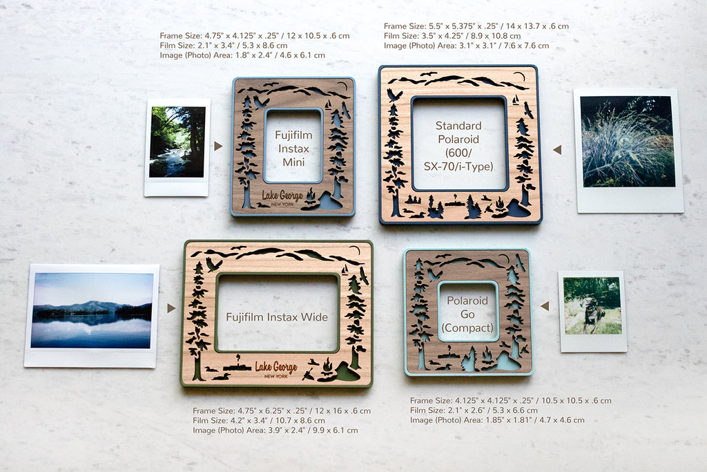 Two Polaroid photo frames and two Fujifilm Instax frames including Instax Mini and Instax Wide with a Lake George NY design. The frames are lying on a white marble surface next to their compatible photographs. The four available sizes include: Fujifilm Instax mini frame, Fujifilm Instax wide frame, Polaroid Go frame, and Standard Polaroid frame for 600 / SX-70 / i-Type Polaroid cameras. The image shows frame and photograph dimensions.