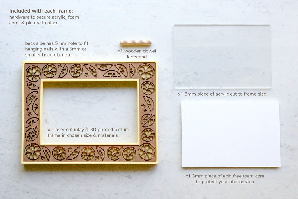 Lemon picture frame for summer decor, including high quality frame-grade acrylic and acid free foam core to protect your photographs. Turn-key hardware holds everything in place, and a wooden kickstand can be inserted for tabletop use.