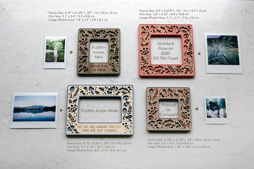 Two unique mushroom Polaroid photo frames and two Fujifilm Instax frames including Instax Mini and Instax Wide. The frames are lying on a white marble surface next to their compatible photographs. The four available sizes include: Fujifilm Instax mini frame, Fujifilm Instax wide frame, Polaroid Go frame, and Standard Polaroid frame for 600 / SX-70 / i-Type Polaroid cameras. The image shows frame and photograph dimensions.