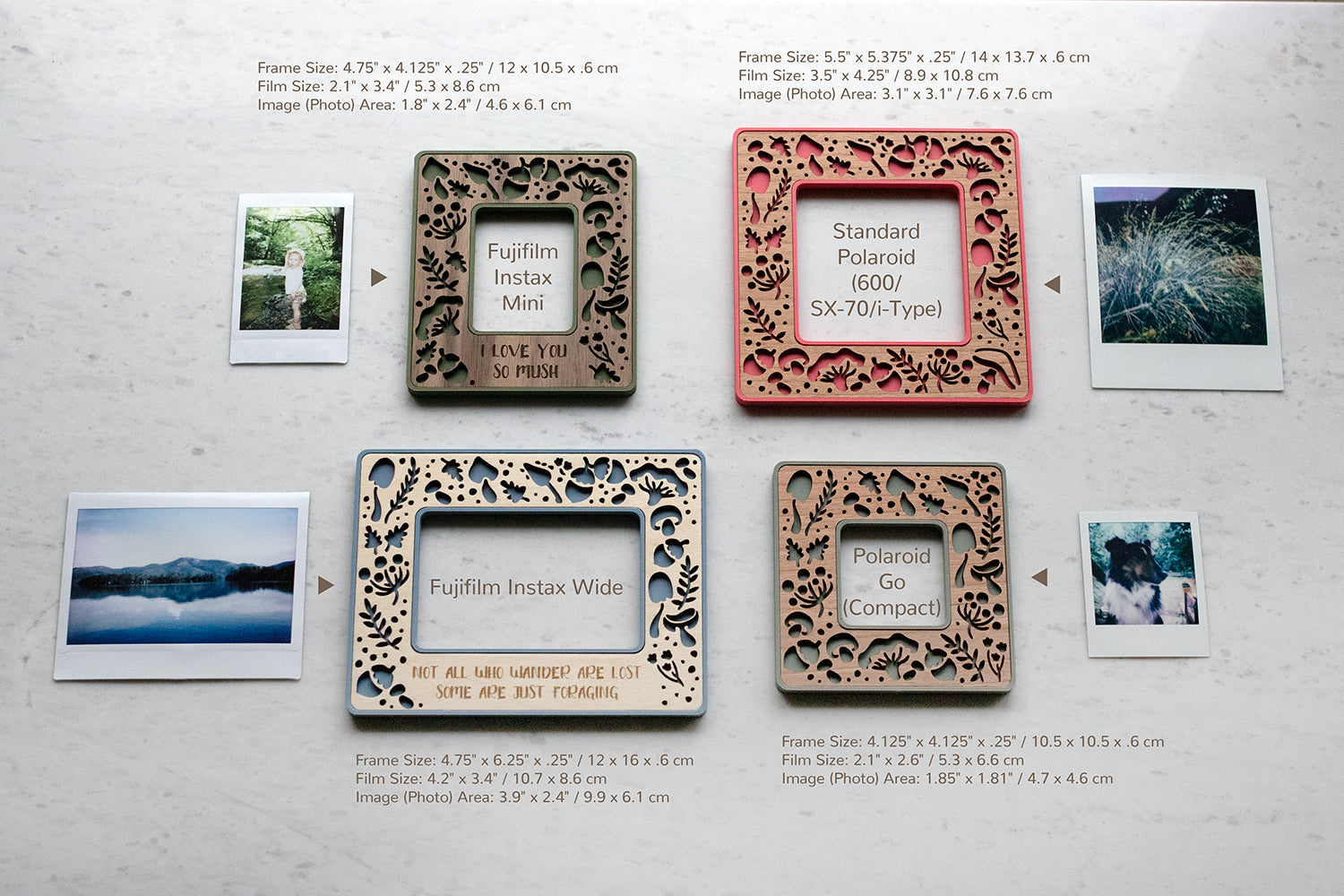Two unique mushroom Polaroid photo frames and two Fujifilm Instax frames including Instax Mini and Instax Wide. The frames are lying on a white marble surface next to their compatible photographs. The four available sizes include: Fujifilm Instax mini frame, Fujifilm Instax wide frame, Polaroid Go frame, and Standard Polaroid frame for 600 / SX-70 / i-Type Polaroid cameras. The image shows frame and photograph dimensions.
