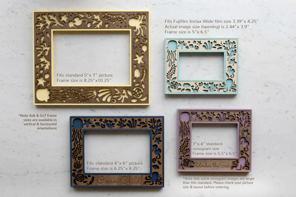 Four beach themed picture frames shown lying flat on a white counter. Frame sizes include 5x7 frame, 4x6 frame, sonogram 3x4, and Fujifilm Instax Wide polaroid frame. Picture frames are shown in dark blue, light blue, purple, and yellow.