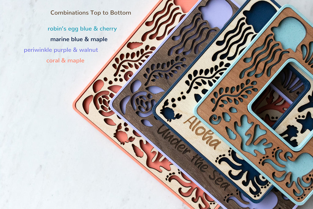 Mini magnetic refrigerator frames featuring laser cut ocean animals and coral from under the sea. Frames are available in various sizes, wood types, and colors.