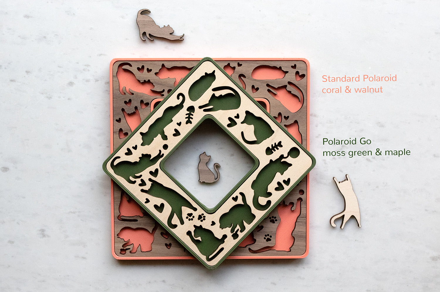 Magnetic polaroid frames for cat lovers in green and coral pink with walnut and maple wood inlays. The frames are custom laser cut and available in various colors, wood types, and made to order with or without personalization. These mini frames make great small gifts for cat owners.  The frames are surrounded by tiny laser cut wooden cats in cute cat positions.