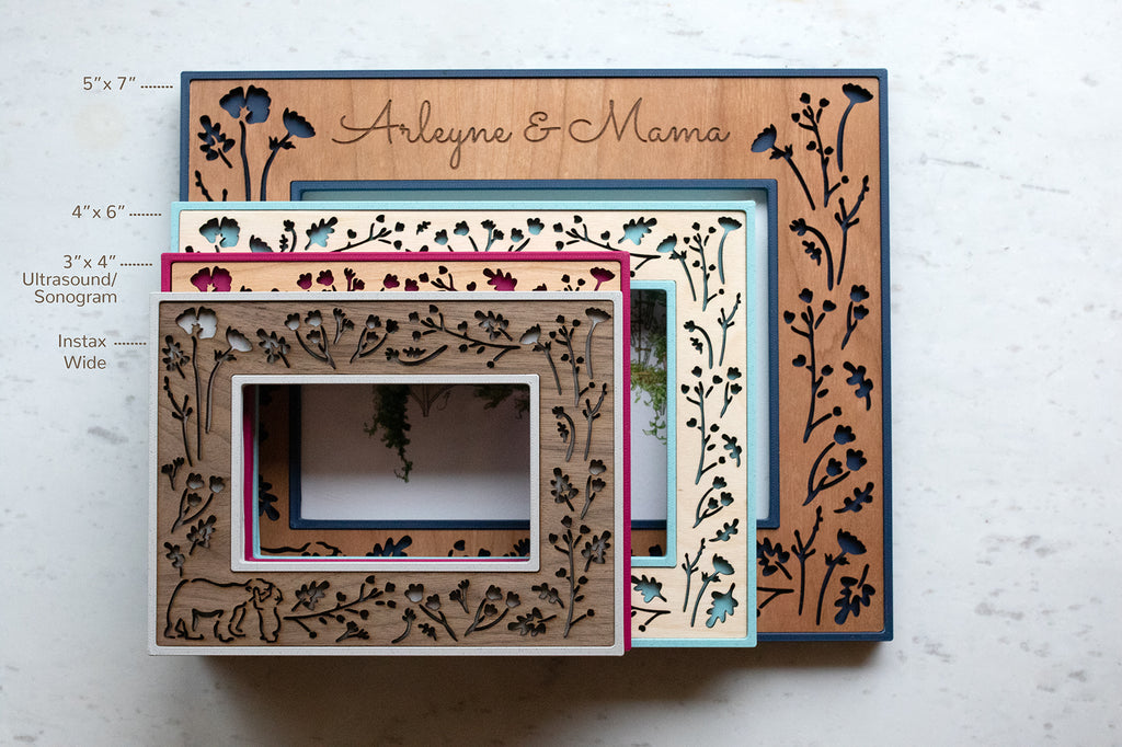 Front view of four sizes for mama and baby bear woodlands photo frames. Sizes include 5"x7", 4"x6", 3"x4" standard ultrasound sonogram size, and Fujifilm Instax Wide 3"x4" film size.