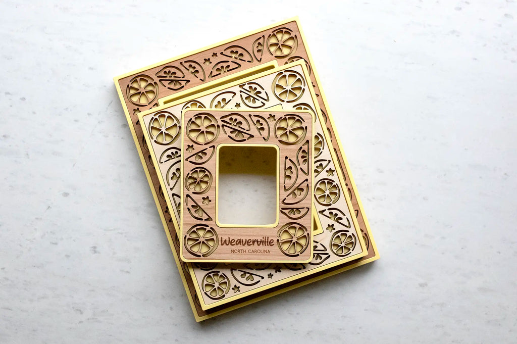 Fruit lover lemon picture frames with yellow housing and laser cut wooden inlays. Frames can be personalized with laser engraved messages.